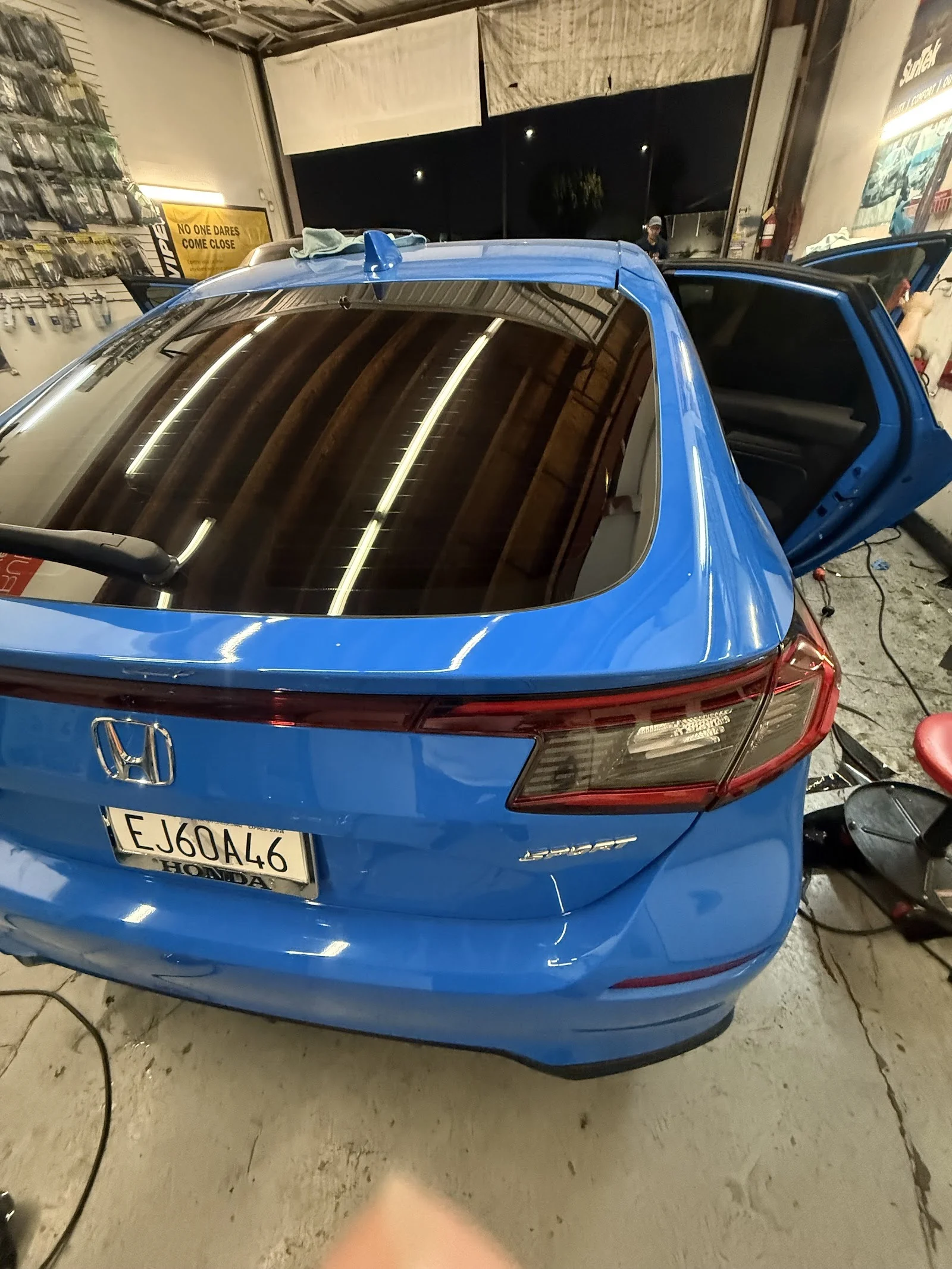 Fresh rear-window tint on a blue Honda at Colombian Tint LA, Los Angeles